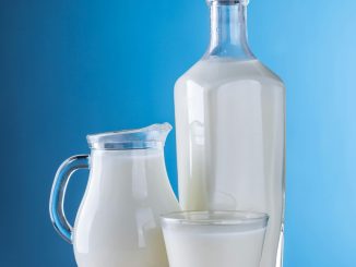milk for muscle gain - a jug,glass, and bottle
